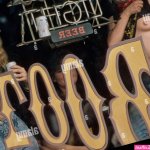 Women in a bar flashing breasts during Bike Week in Daytona Beach Florida USA Stock Photo