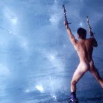 Mature man climbing ice wall naked in Iceland stock photo
