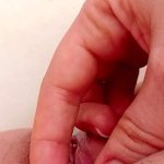 pulling her pussy lips open