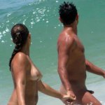 Sexy couple walks on the nudebeach looking at the oceanwaves Share the Love nudebeach nude naked nudism nudistbeach naturist naturism sexycouple