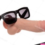 Big realistic dildo with sunglasses isolated on white. Mr Cooldick. Stock Photo booblikuk 266738496
