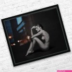 Wall Art print MXI31844: Art nude side view of a woman sitting naked in studio with black background by MaximImages Wall Art Wall Art
