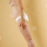 Side View of a Woman Showing Her Nude Body Stock Image