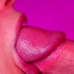 Close blowjob with lip gloss with juicy cum on tongue