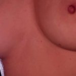Caressing the beautys breasts and licking her nipples. Perfect tits and loud moans