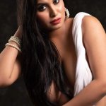 Desi model showing off her tits in just her saree and posing almost topless